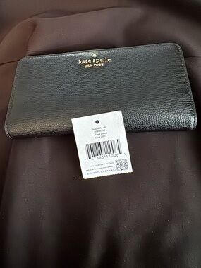 kate spade black leather zip-around wallet with gold logo